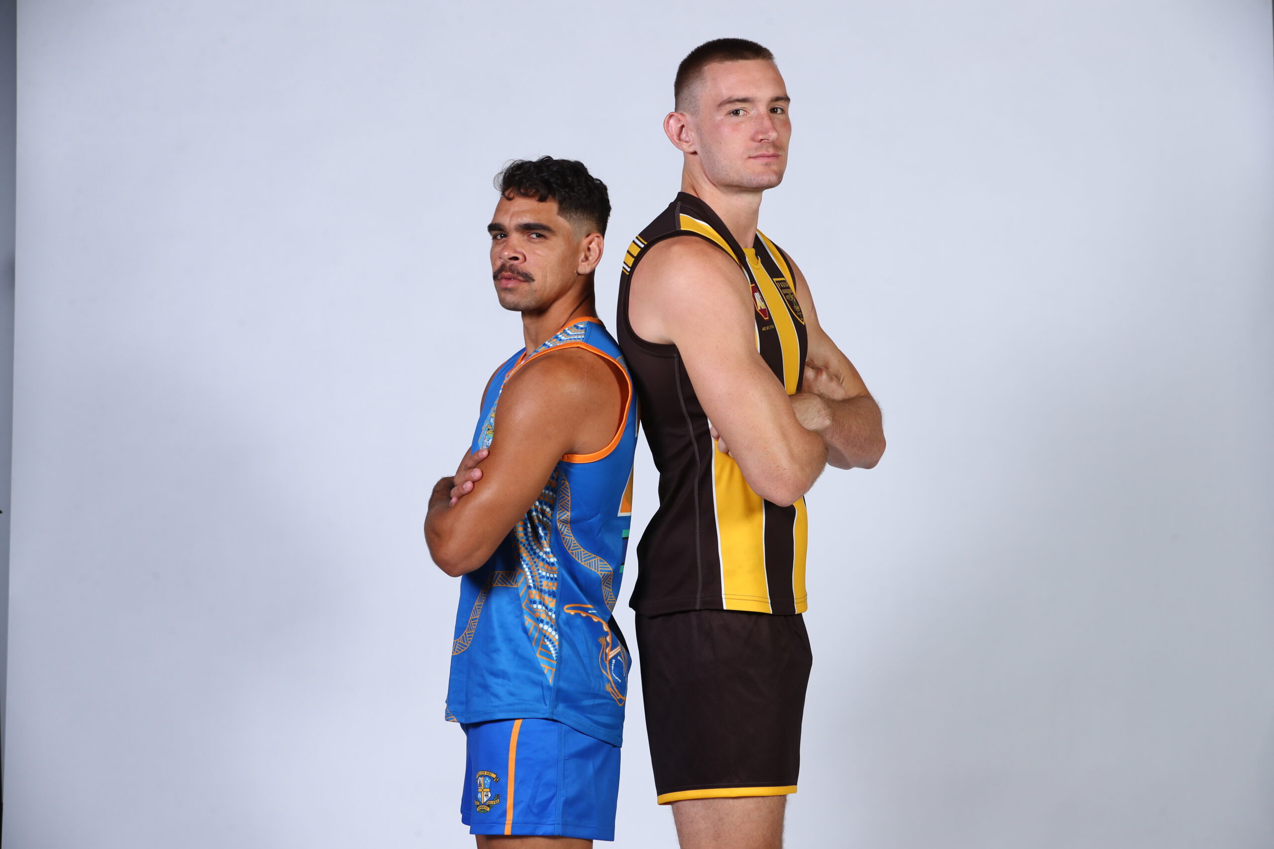 Charlie Cameron and Harris Andrew in their Marist College Ashgrove and Padua College playing kit ahead of tonight's AIC AFL match